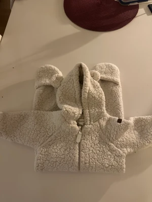 Overall från newbie  - Teddy overall från newbie storlek 62 Använd fåtal gånger den är i nyskick 