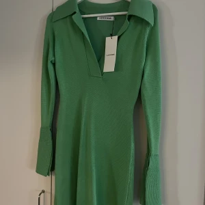 Klänning från Adoore - Klänning från adoore, samma modell som på bilden men grön. Storlek 34. Aldrig använd.