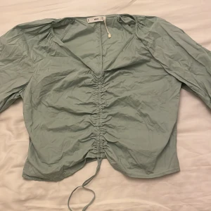 Mintgröna topp - Topp från mango som använts en gång. Lite liten i storlek