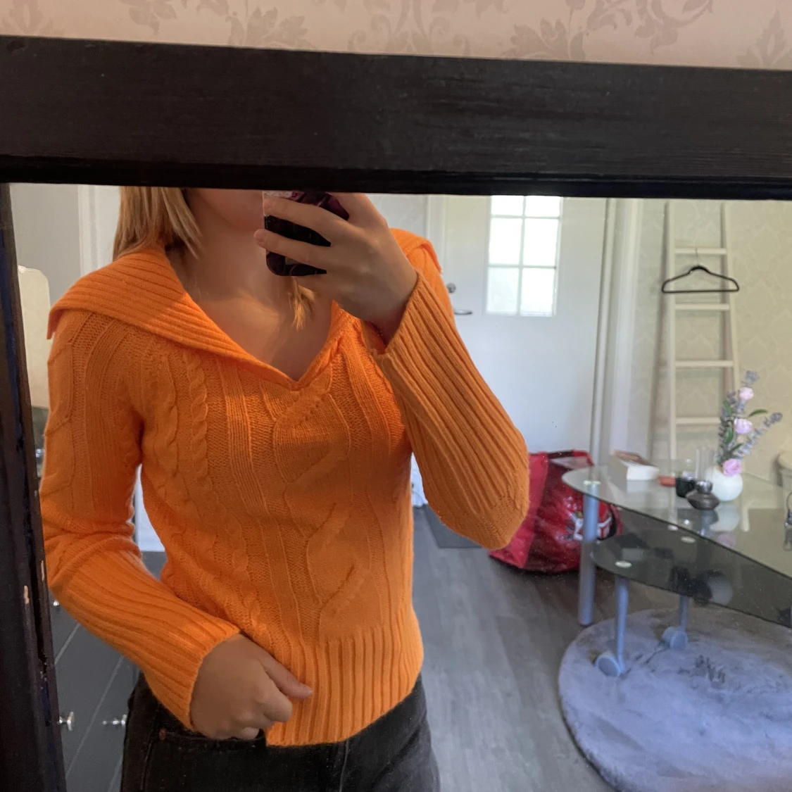 Stickad orange tröja