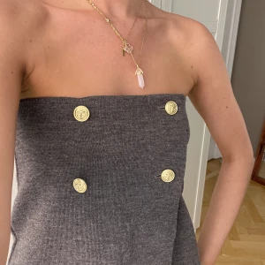 Busnel kjol/topp - En jättefin brun kjol från busnel som går lika bra att använda som topp. Nypris ca 2000