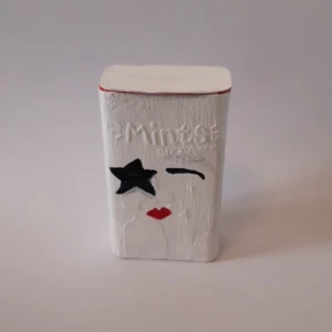 Kiss candy box - Selling a hand painted candy box inspired by the band kiss and the lead singer starchild. The price includes the cost of the paint and the time it took to paint. It can not survive water but its really pretty as a decoration! Contact me for questions!