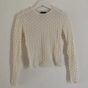 Topp med textur  - Ascool topp med textur. Sparsamt använd. Passar xs-m 
