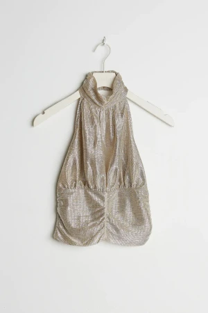 Festtopp  - Slutsåld festtopp från Gina Tricot. Köpt här på plick, men i mycket gott skick. Är i storlek xxs, men passar också xs/s! 