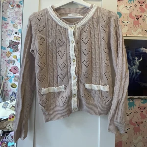 Stickad kofta  - Gammalrosa stickad kofta, köpt i Japan 