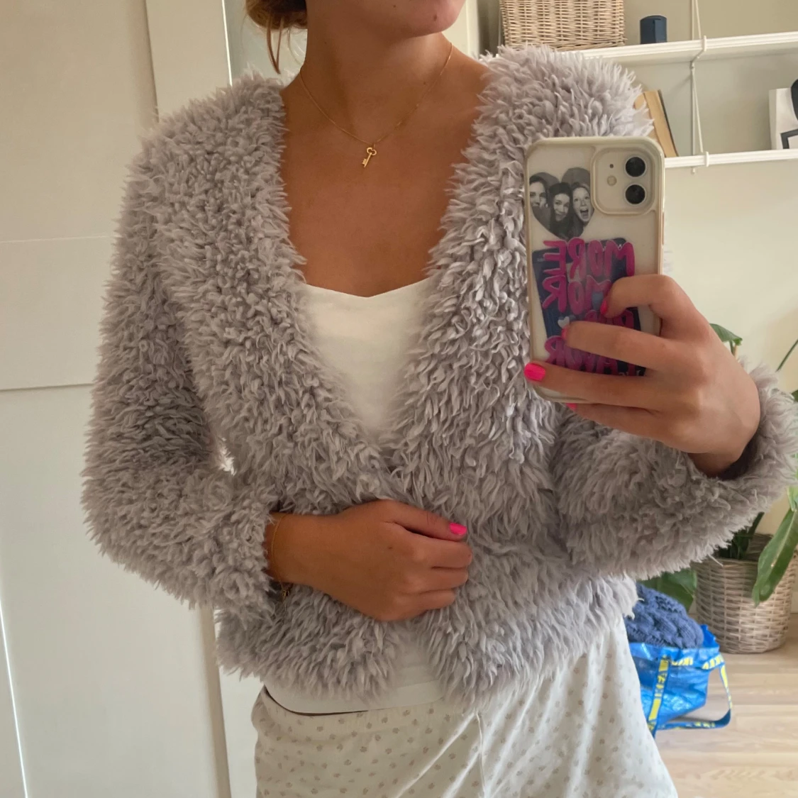 Ljusgrå fluffig pälsjacka
