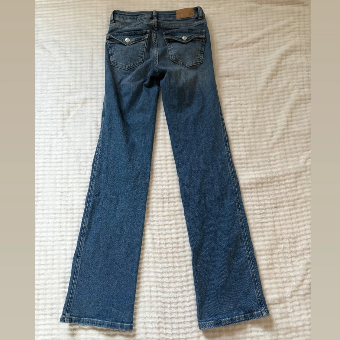 Blå bootcut jeans  - 1