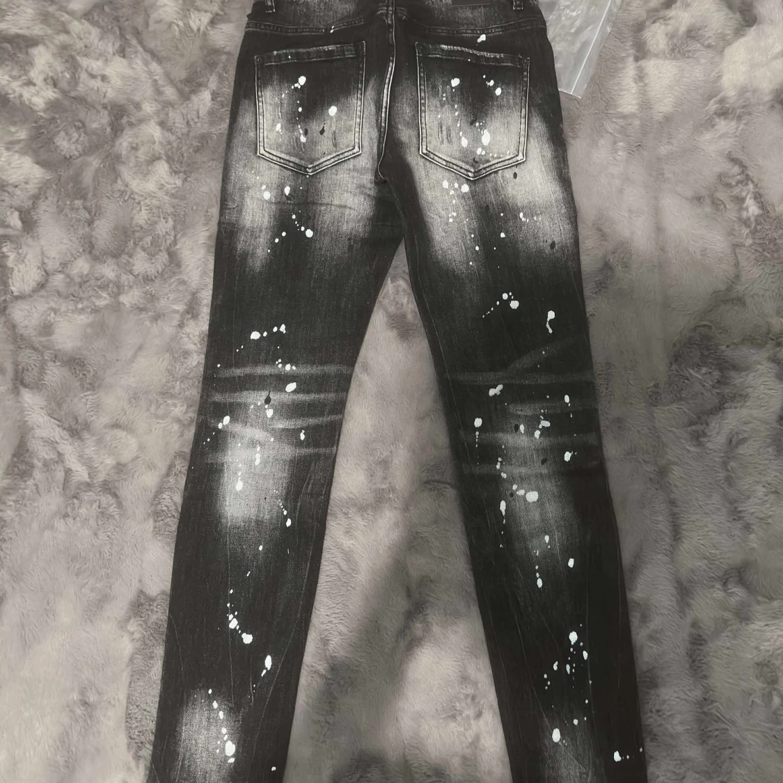 Svarta Dsquared2 jeans med färgstänk - 1
