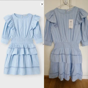 Klänning name it storlek 164/xs - Oanvänd klänning från name it i storlek 164/xs. Passar perfekt till skolavslutningen, examen eller bara ha till sommarn!