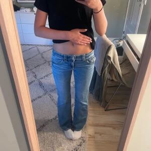 Lågmidjade jeans - Lågmidjade, bootcut jeans i storlek 158 