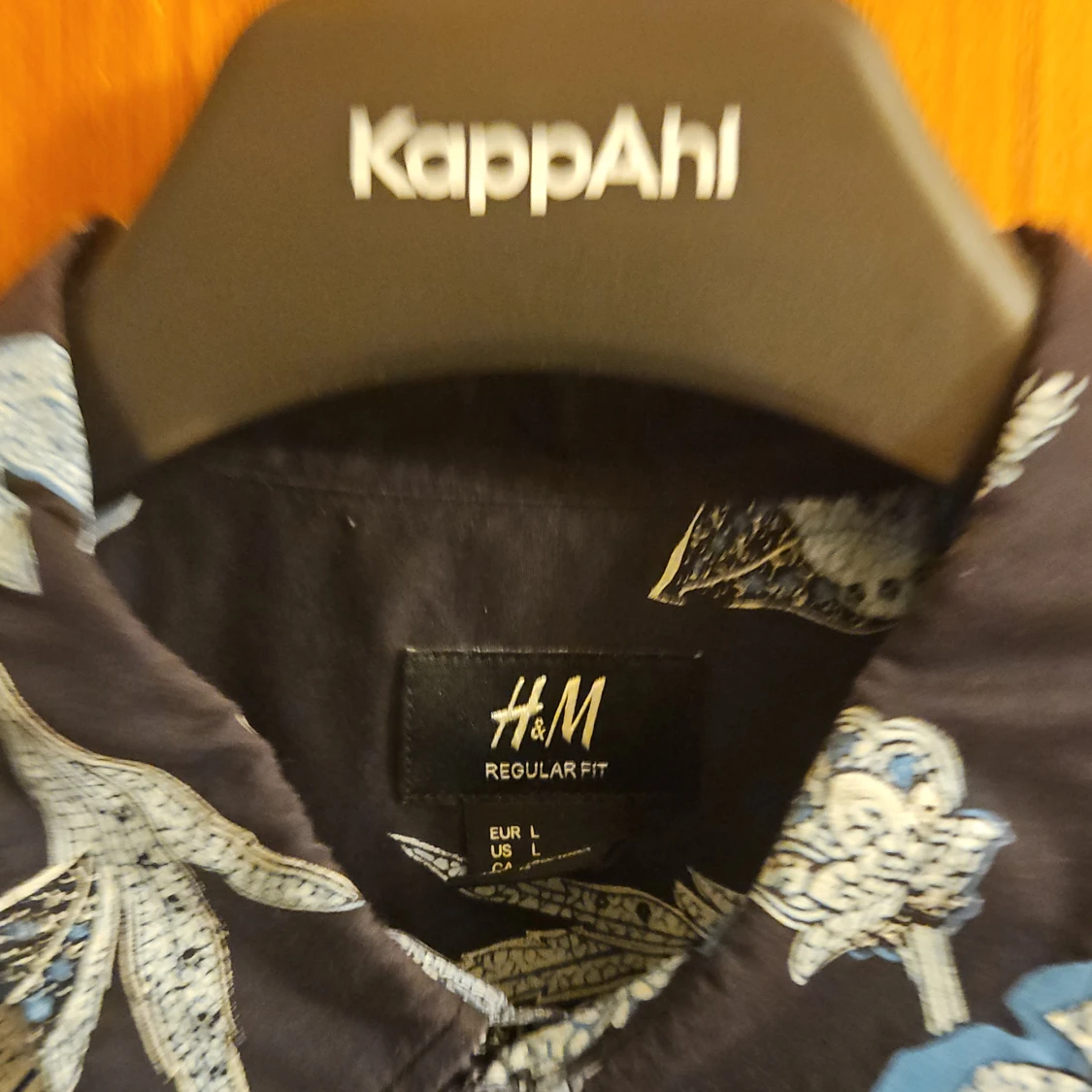 Blommig kortärmad skjorta från H&M - 1