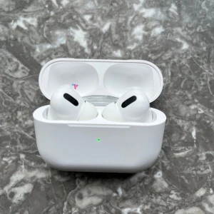 Vita hörlurar - Oanvända