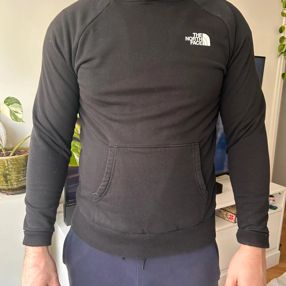 Svart hoodie från The North Face