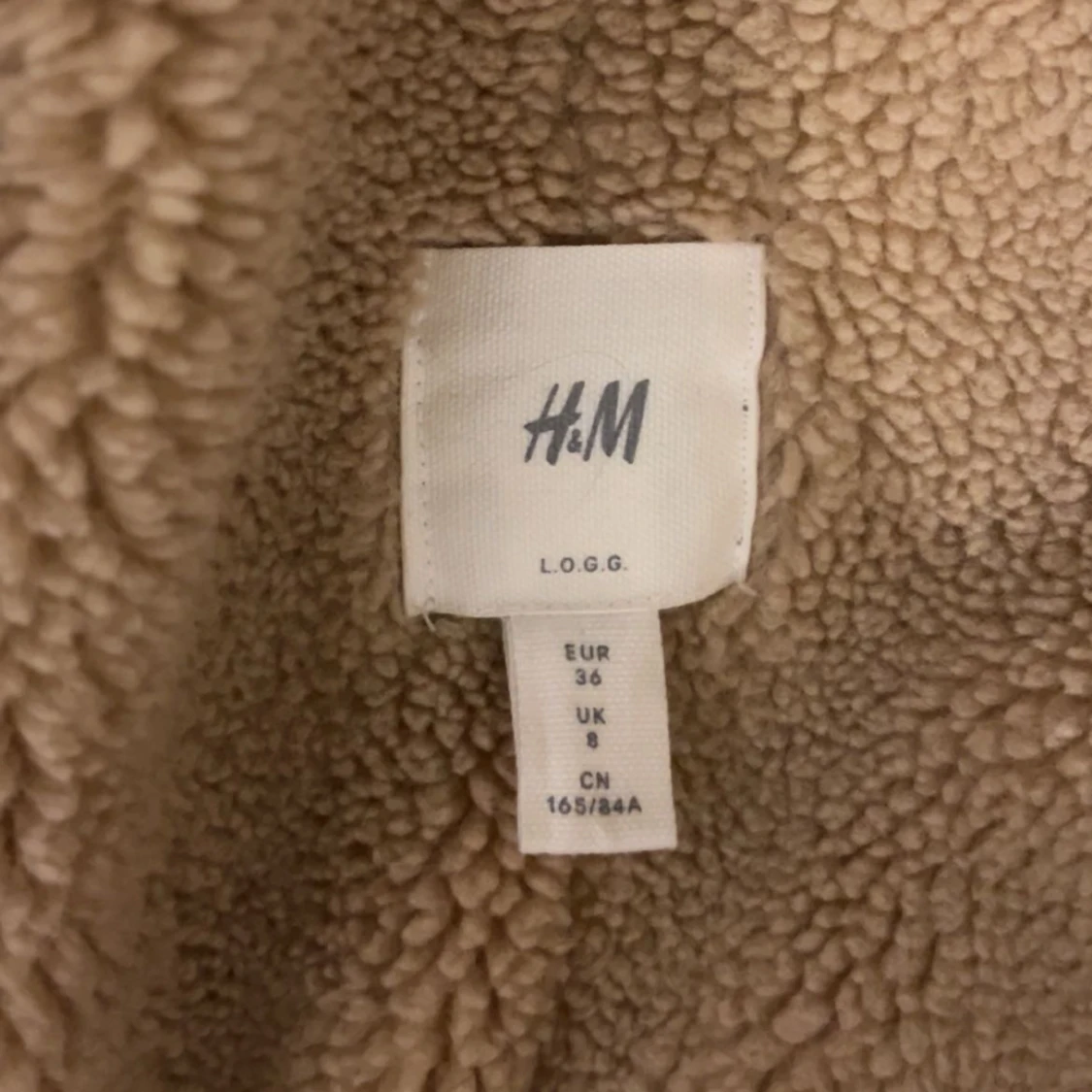 Brun jacka med teddyfoder från H&M - 2