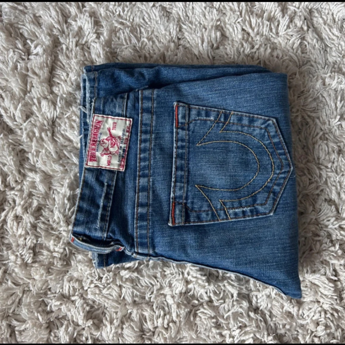 Blå bootcut jeans från True Religion