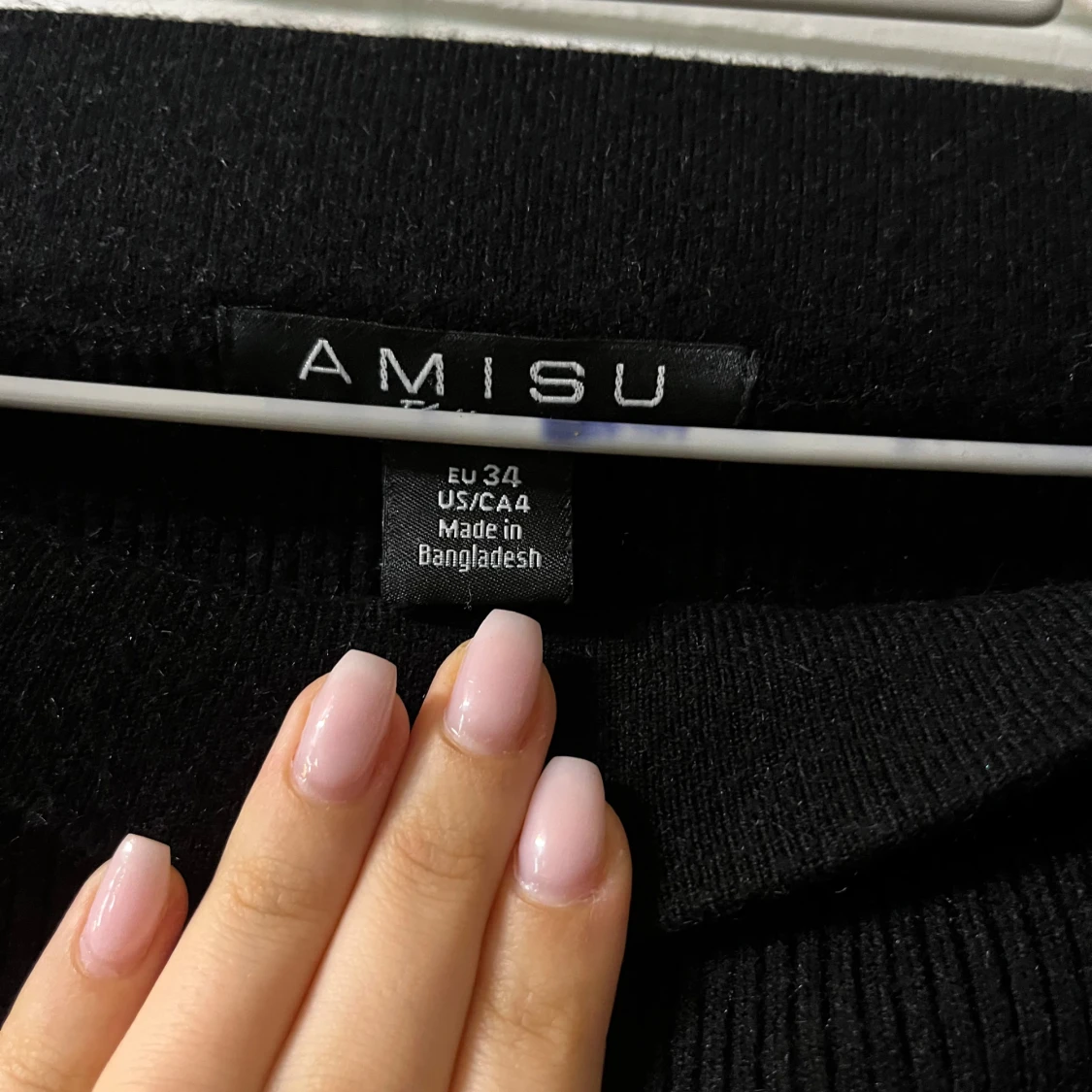 Svart stickad kjol från Amisu(kan användas som en tubtopp om det så önskas) - 1