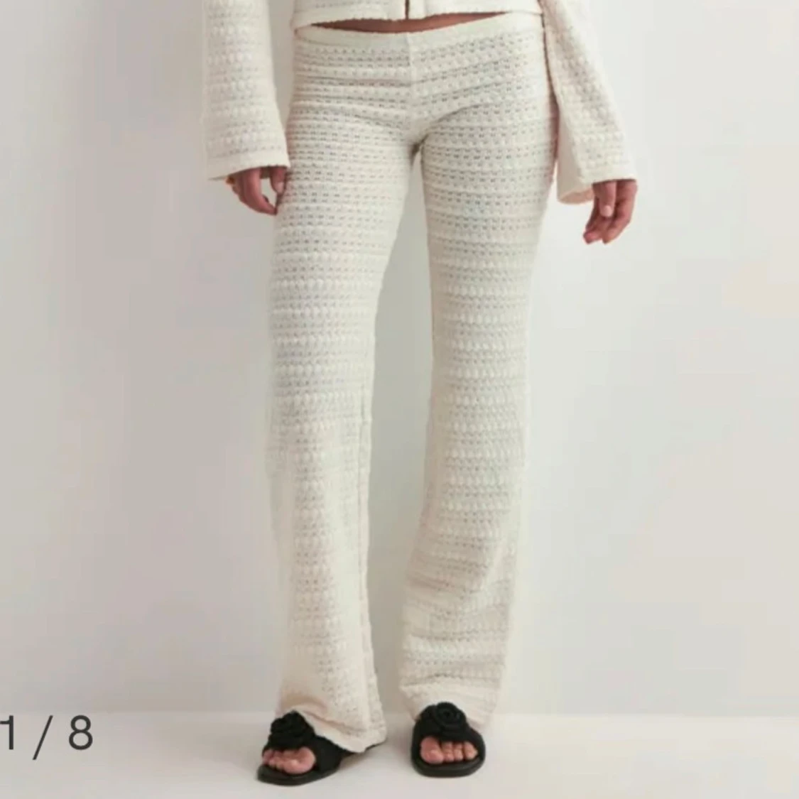Vita stickade byxor