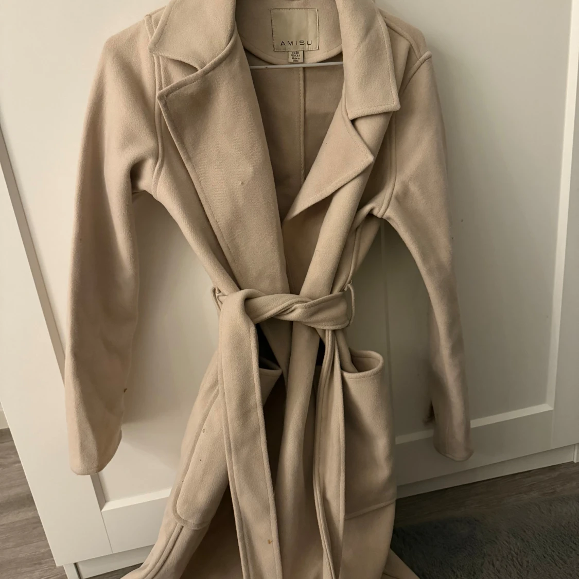 Beige kappa från Amisu - 2