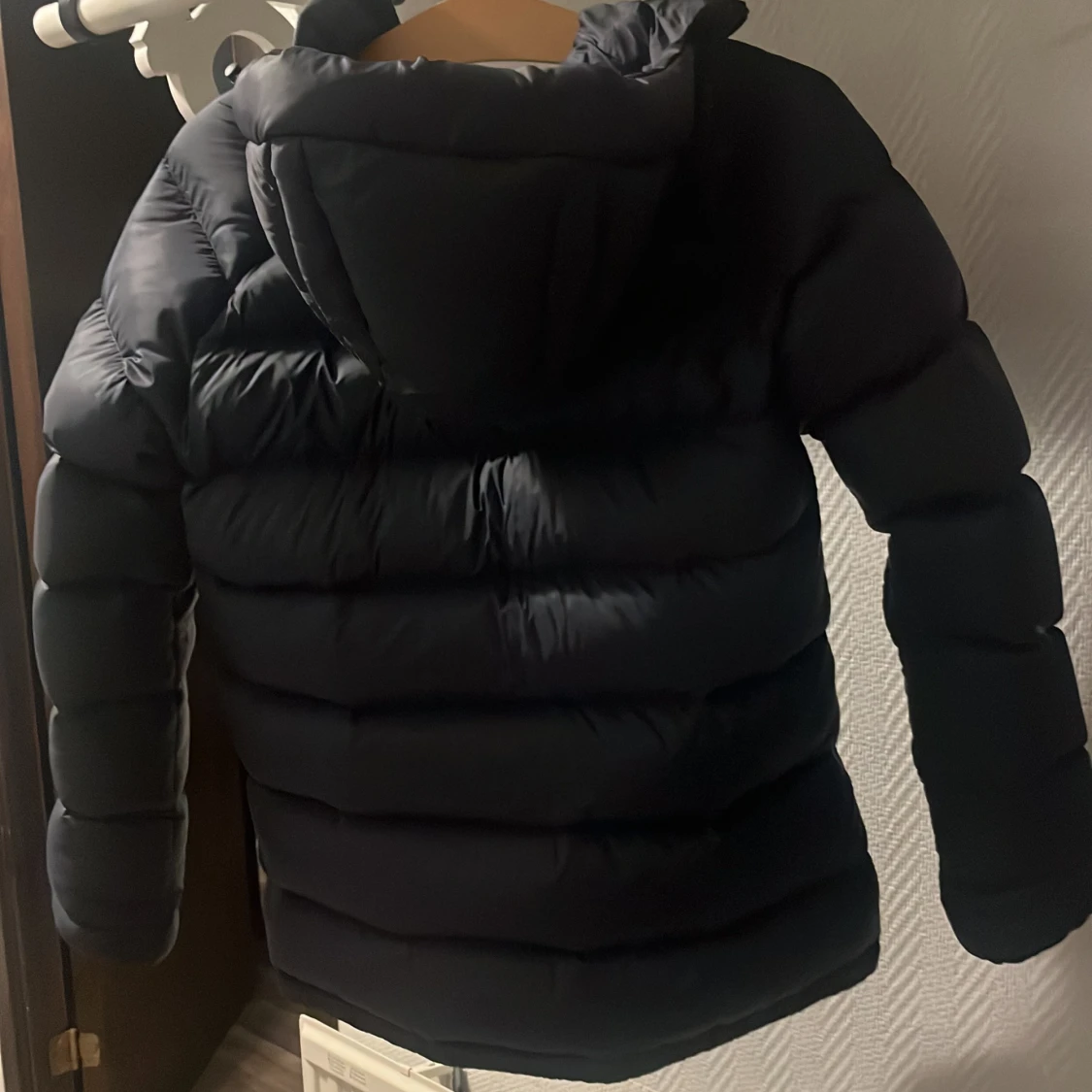 Mörk blå dunjacka Peak Performance - 2