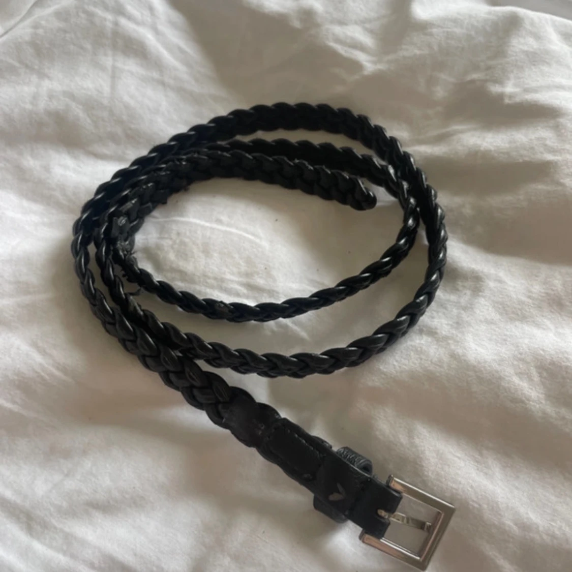 Svart flätat bälte
