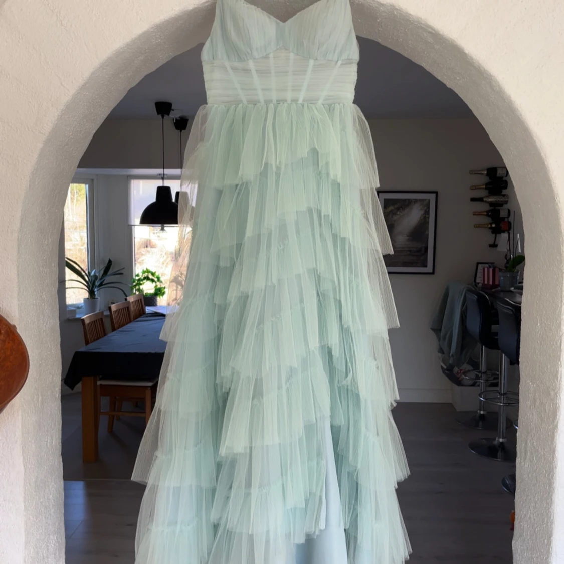 Turkos balklänning med volanger - 1