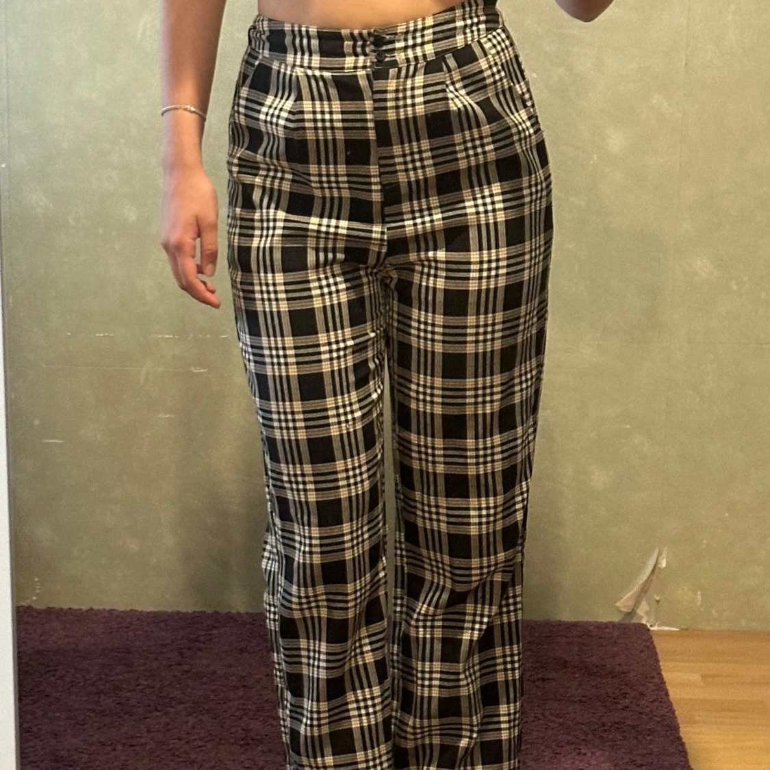 Svarta och vita rutiga kostymbyxor