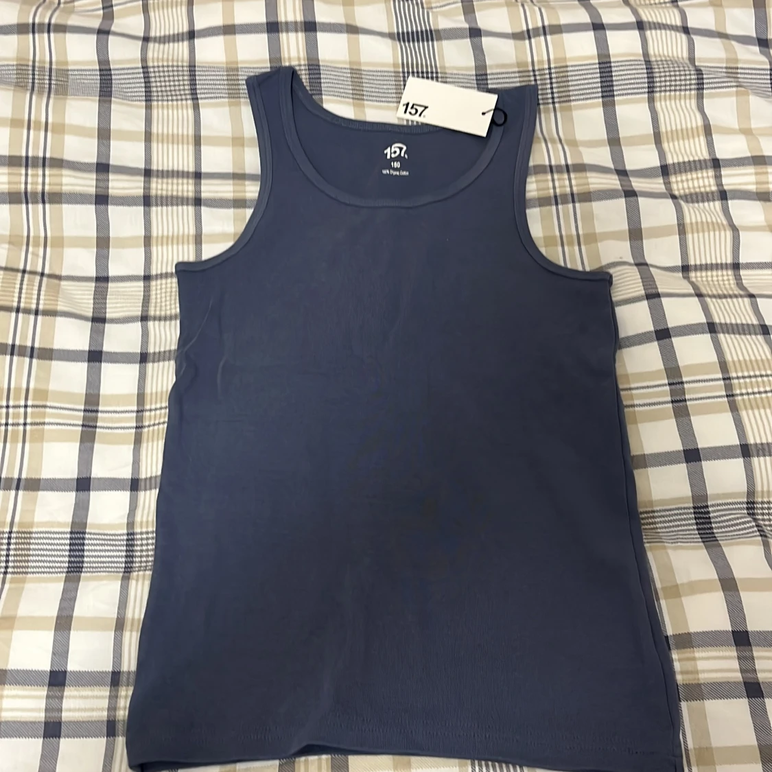 Mörkblå linnetopp från 157