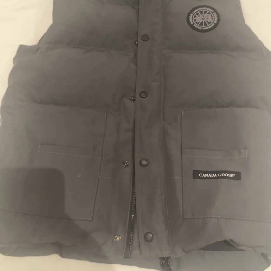 Grå dunväst från Canada Goose