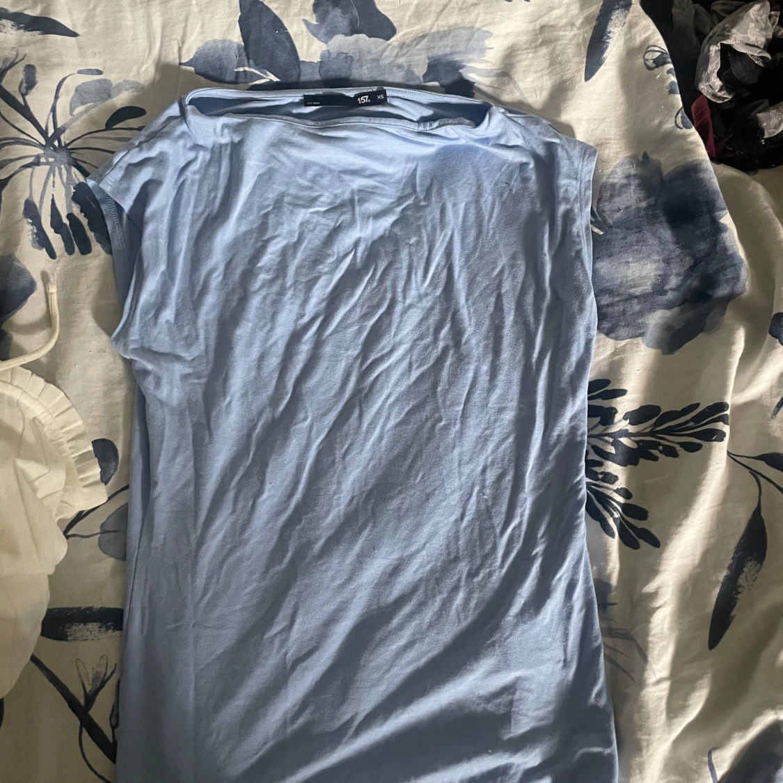 Ljusblå ärmlös topp från 157