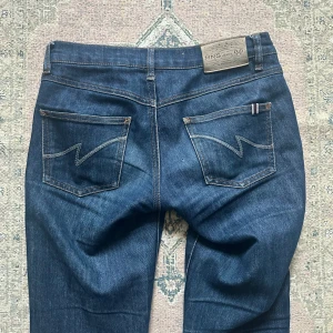 Lågmidjade bootcut jeans från MNG - W25 L32