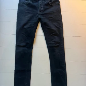 Nudie jeans  - Jeans från Nudie i modellen grim Tim, storlek 31/32