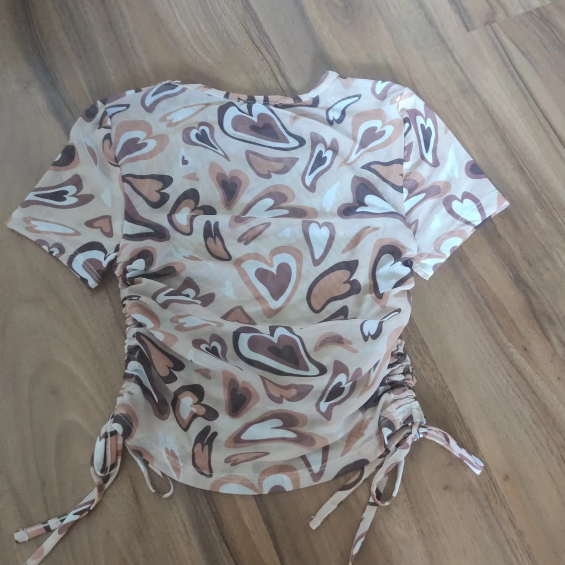 Beige mesh topp med hjärtan FB Sister - 1