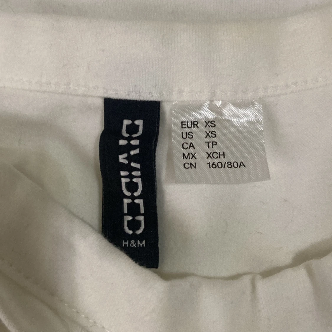 Vit kortklänning med tryck från H&M Divided - 2