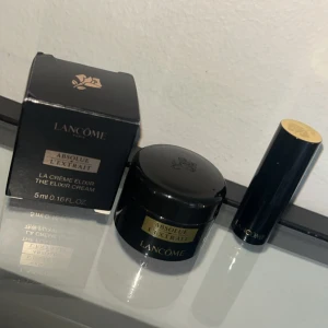 Lancôme set  - Lancôme Absolue L'Extrait The elixir Creme, 5 ml + L’Absolu Rouge Cream Lipstick travelsize 1,6 g (original is 3,2g) in shade 132 Caprice De Rouge.  Nya/oanvända båda två. 