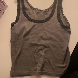 Brandy linne  - Super söt brandy tank top, som är knappat använd och har inga defekter.  