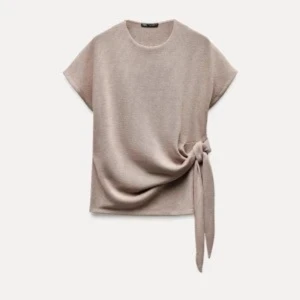 Beige topp med knyt i sidan  - Beige stickad tröja med knyte i midja från Zara, storlek S, använd en gång