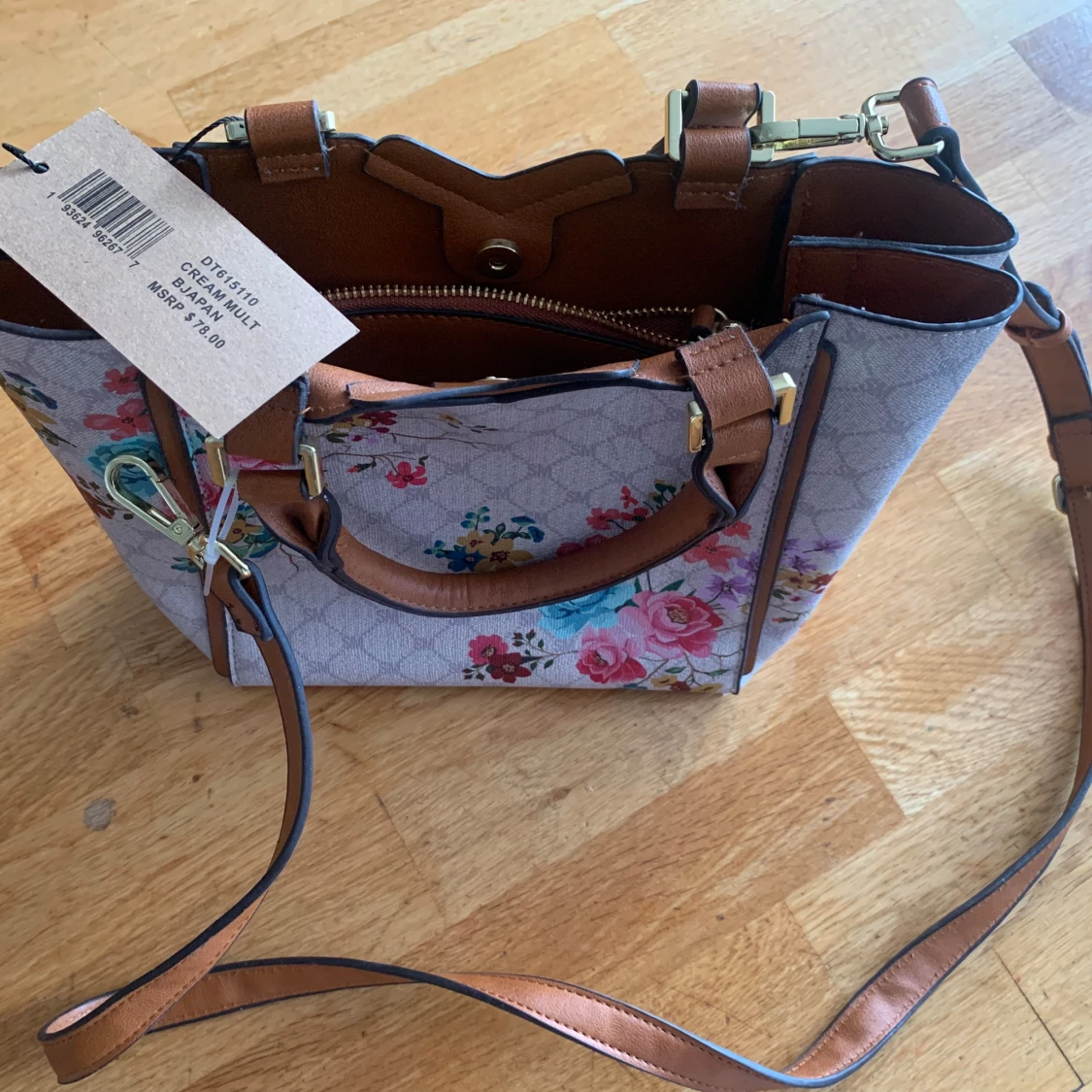 Beige axelväska med blommigt mönster - 1