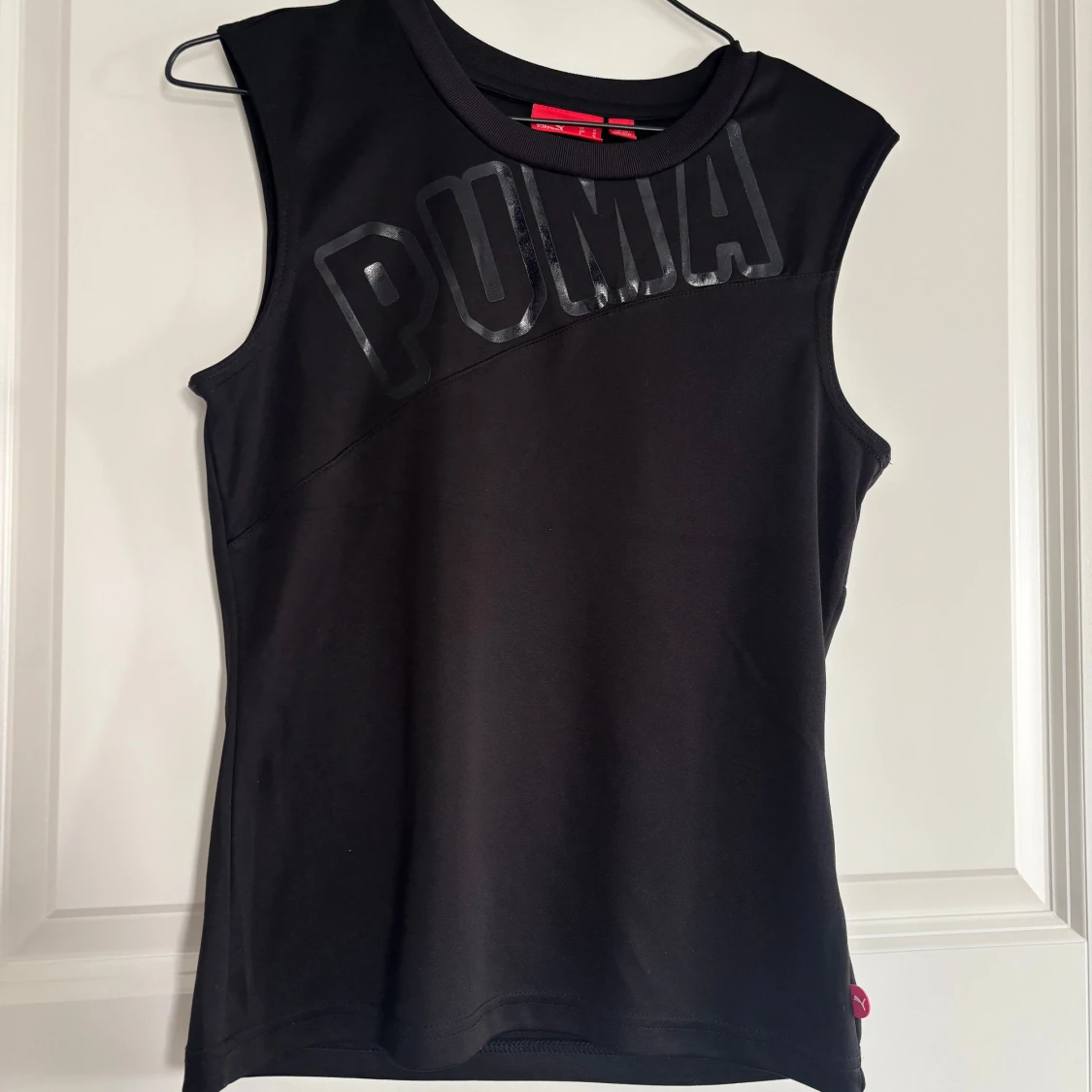 Svart ärmlös träningstopp från Puma