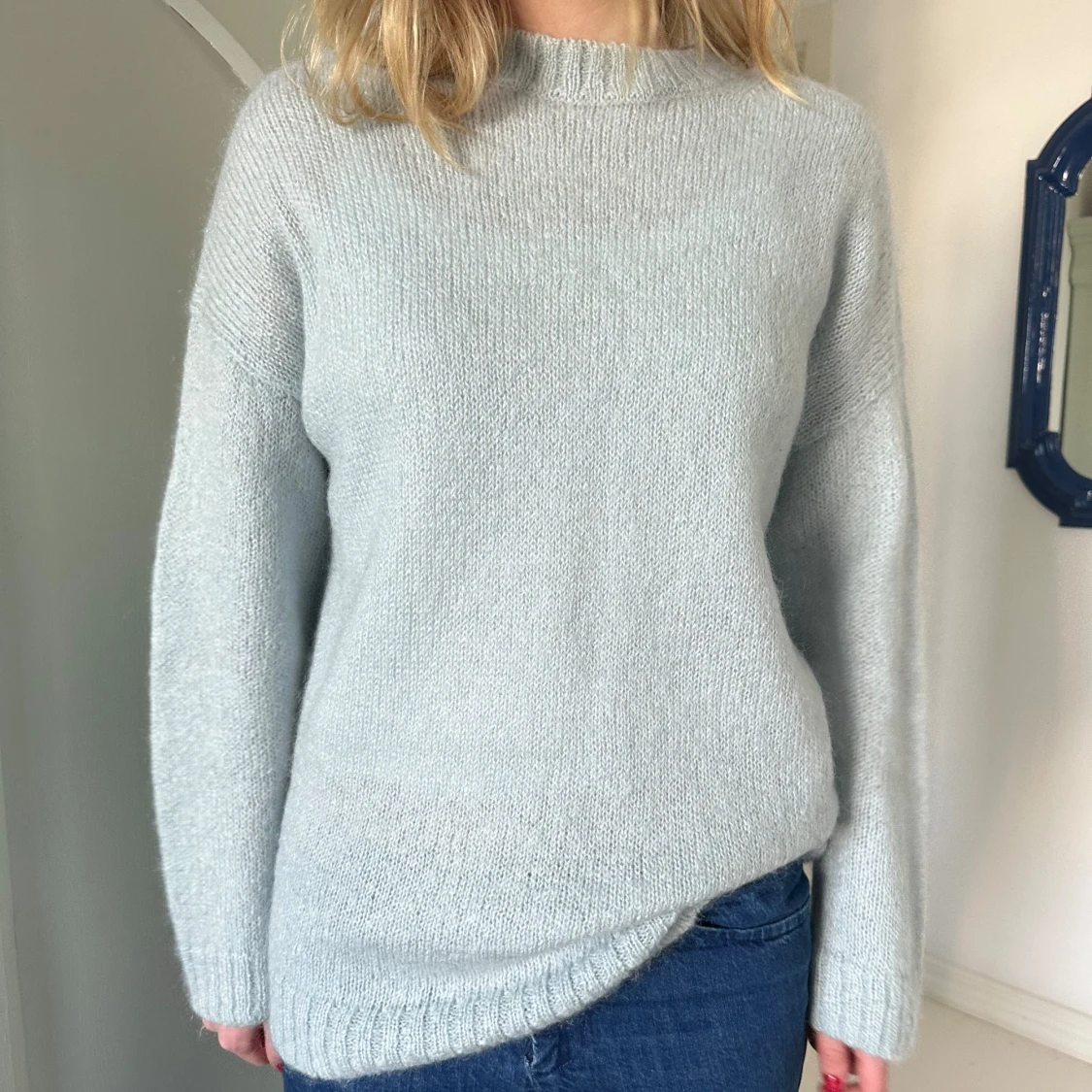 Ljusblå stickad tröja