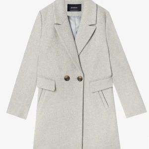 Kort kappa  -  ej använd endast testat den en gång.  Ord 699 köpt på Zalando 