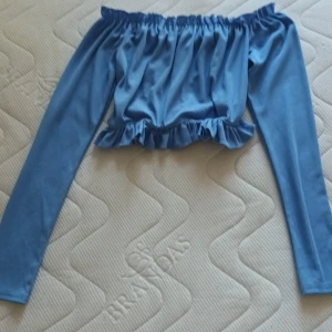 Of-shoulder topp - Storlek XS NLY Trend