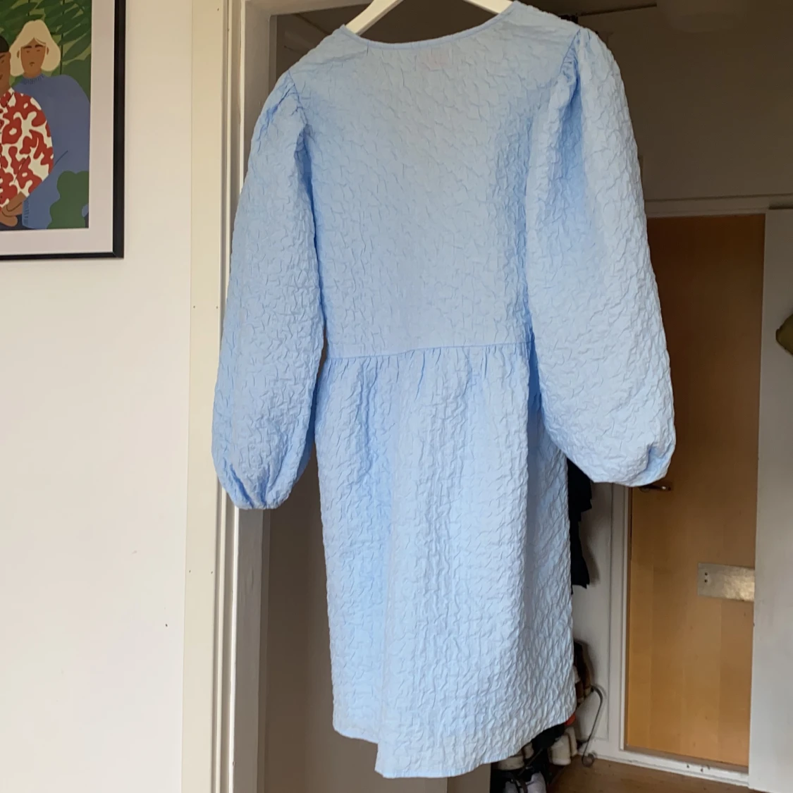 Ljusblå omlottklänning - 91