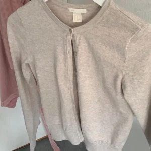 Beige kofta - Beige kofta i storlek Xs