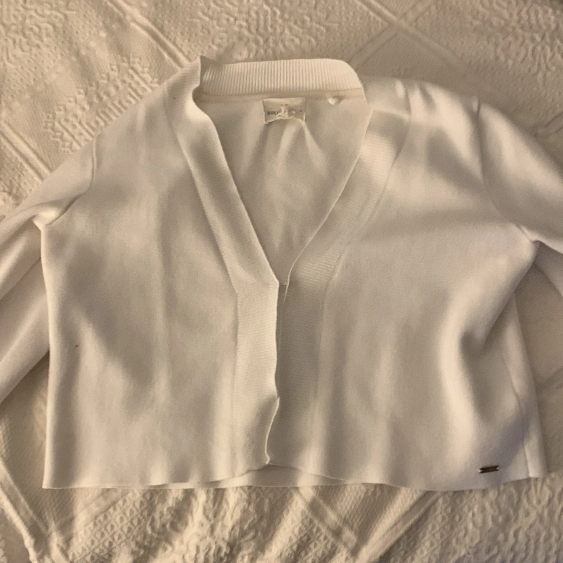 Vit kort kofta från Holly&Whyte