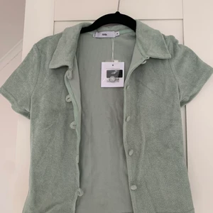 Topp - Jättefin mintgrön froté topp från adika! Aldrig använd med prislappen kvar! Den är lite croppad och i storlek S! Passar XS-S💙