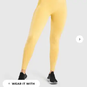 Nya aldrig använda gula tights från gymshark i storlek S