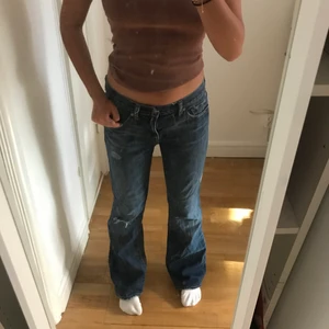 lågmidjade jeans  - lågmidjade baggy jeans
