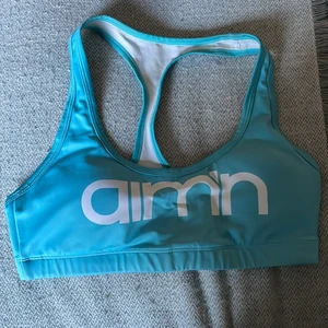 Aimn sport-bh  - Turkos sport-bh från aimn. Använd men bra skick 