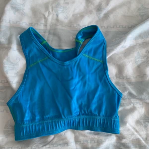 Blå sportbh  - Fin blå sport bh, använd fåtal gånger.