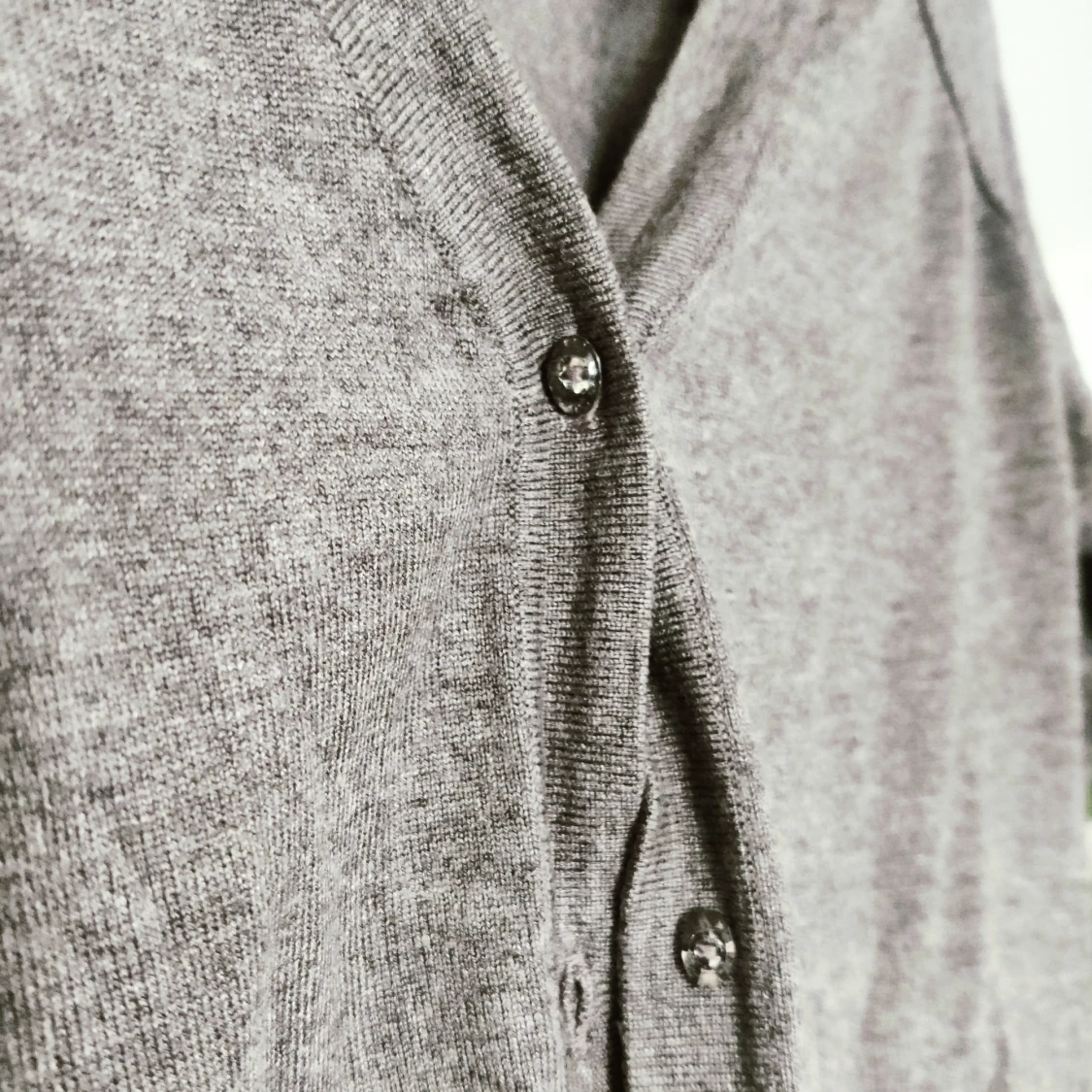 Kofta med glittrande knappar - 90